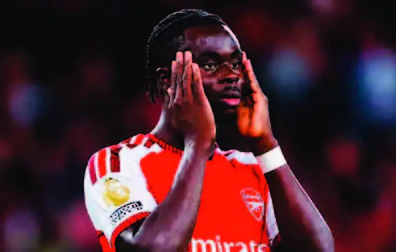 Un joueur d’Arsenal dépité après la défaite contre Brighton.